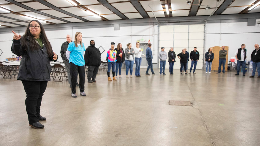 Director of Lewis County Public Health and Social Services Meja Handlen prepares as doors open for a Project Homeless Connect event in the Blue Pavillion at the Southwest Washington Fairgrounds on Thursday.