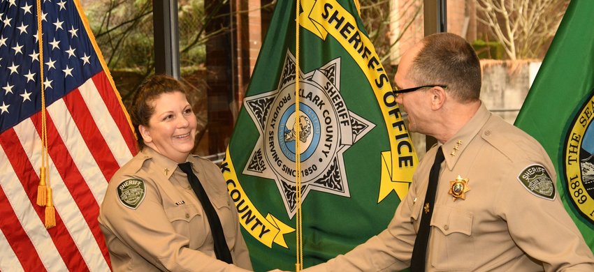 Newly sworn-in Clark County Sheriff&rsquo;s Office Chaplain Cari Arnsparger shakes Sheriff John Horch&rsquo;s hand following a ceremony that officially made her a part of the department on Jan. 4.