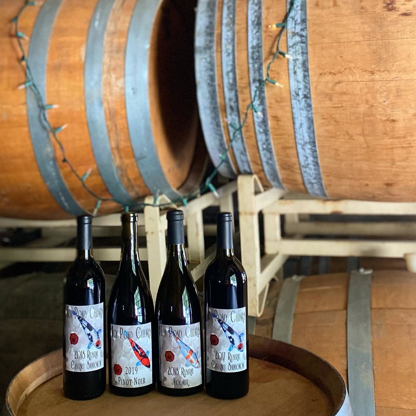 A selection of wines from Koi Pond Cellars in La Center sits on display. Koi Pond Cellars is one of 21 wineries participating in the Southwest Washington Winery Association&rsquo;s wine and chocolate Valentine&rsquo;s Day weekend event.