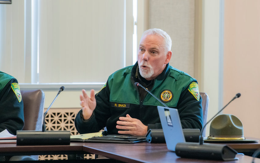 FILE PHOTO &mdash;&nbsp;Lewis County Sheriff Rob Snaza explains difficulties in responding to east county issues during a February meeting at the Lewis County Courthouse.
