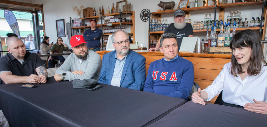 From left, Tenino Mayor Wayne Fournier, Chehalis Tribe Chairman Dustin Klatush, Jeff Warnke, director of government and public relations for the Chehalis Tribe, Perry Shea, with Dragonwheel Investment Group Inc, and Thurston County Manager Ramiro Chavez meeting with Congresswoman Marie Gluesenkamp Perez to talk about concerns in south Thurston County at the Sandstone Distillery last February.