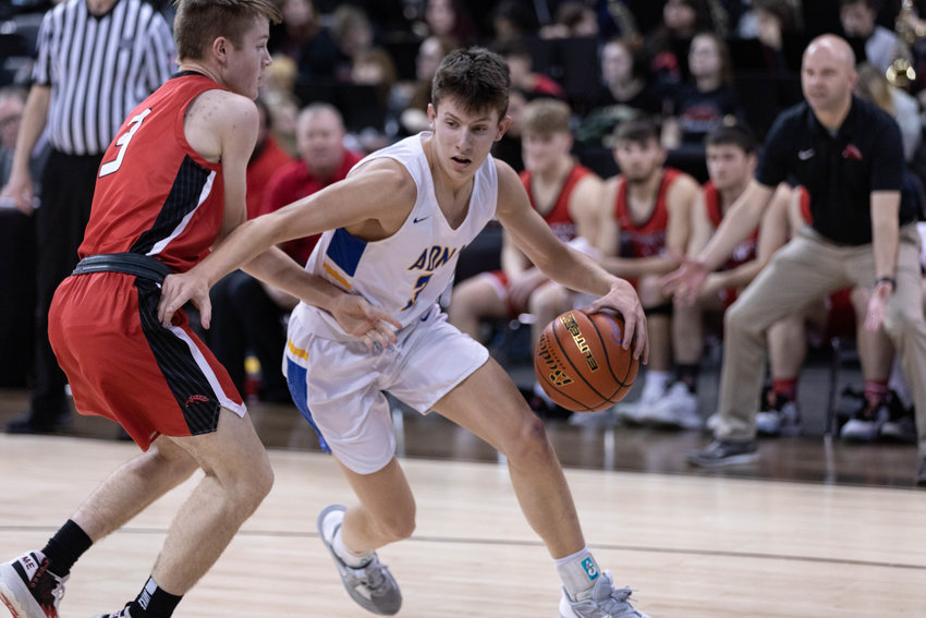 Adna guard Braeden Salme looks to drive baseline against Lind-Ritzville/Sprague/Washtucna in the 2B state round of 12 March 1 at Spokane Arena.