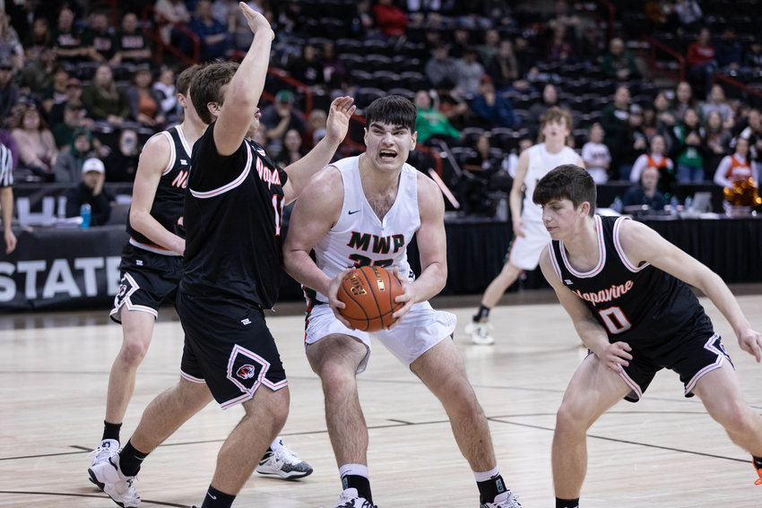 Morton-White Pass forward Josh Salguero gets ready to go up for a layup against Napavine in a loser-out 2B state consolation game at Spokane Arena March 3.