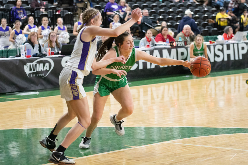 Morgan Simmons tries to corrall the ball during Tumwater's consolation semifinal against Sequim on March 3 in Yakima.