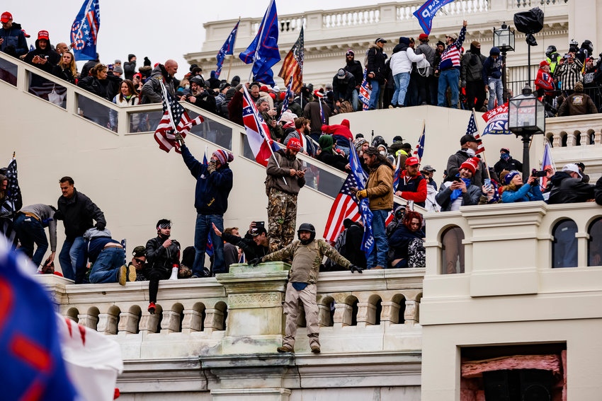 Pro-Trump supporters storm the U.S. Capitol following a rally with President Donald Trump on Jan. 6, 2021, in Washington, D.C.(Samuel Corum/Getty Images/TNS)