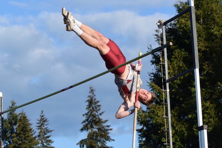 Lucas Hoff goes over the bar in the pole vault at W.F. West's dual meet at Tumwater on March 21.