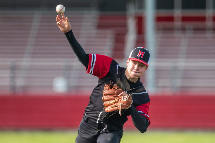 Mossyrock's Keegan Kolb delivers a pitch to Lake Quinault during a district playoff win at home on May 9, 2022.