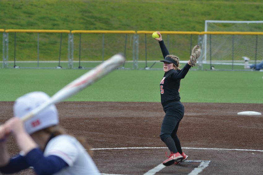 Mallory Hoke delivers a pitch against Ellensburg at Bellevue College on Friday, March 24.