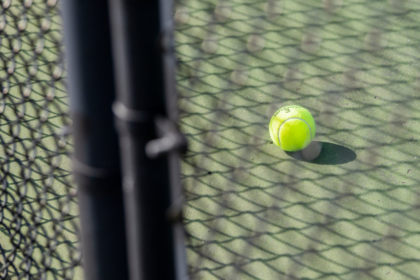 A ball rests near the fence during a Centralia home match against Shelton on Wednesday afternoon.