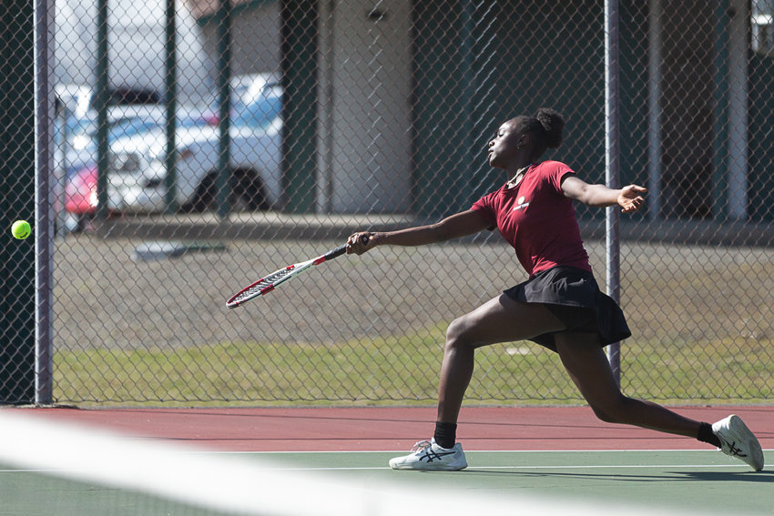 W.F. West singles player Mari Ceesay stretches to return a volley against Tumwater March 29.