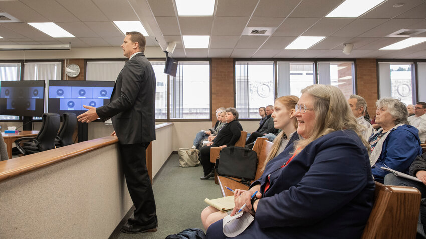 James M.B. Buzzard stands up in front of residents of Winlock to talk to Judge J. Andrew Toynbee in Lewis County Superior Court on Friday, April, 14, 2023.
