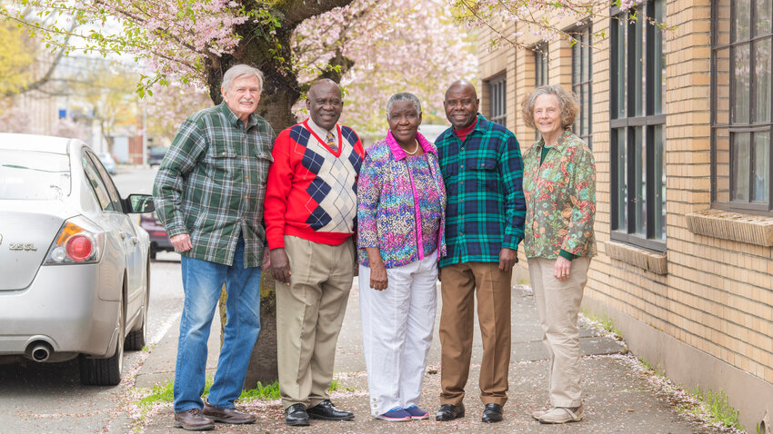 From left, Hank Kirk, former president of Centralia College, Reverend Doctor Howard Matiya Nkhoma and wife of over 55 years, Mariya, Owen Singini, the chief of his village of 80 residents who has worked as a driver for over 35 years, and Jenny Kirk, who, with husband Hank, helped the Nkhomas to establish the University of Livingstonia in Malawi.
