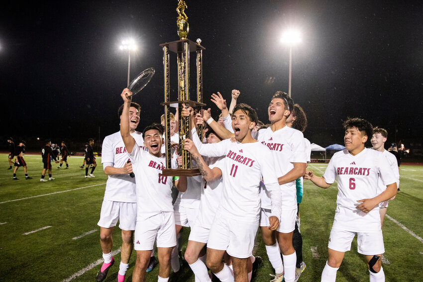 W.F. West players celebrate with the Chronicle Cup after their 1-0 win over Centralia on April 21.
