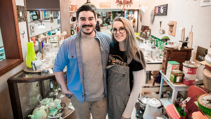 Dominic and Kathleen Ayala smile for a photo inside the Ayala Emporium in downtown Centralia on Thursday, April 20, 2023.