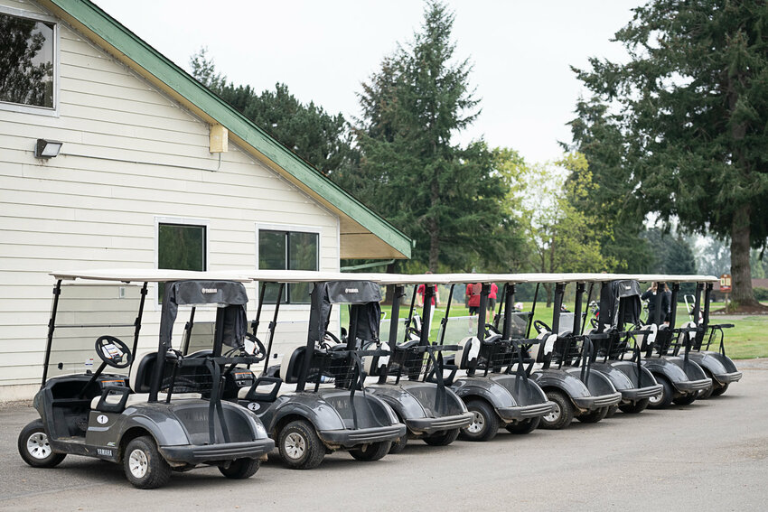 A row of golf carts are parked in front of the clubhouse at Newaukum Golf Course Oct. 5.