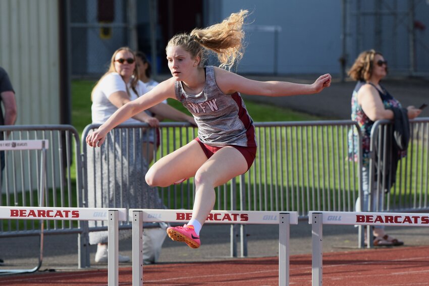 W.F. West's Emily Mallonee clears a hurdle in Chehalis April 26.