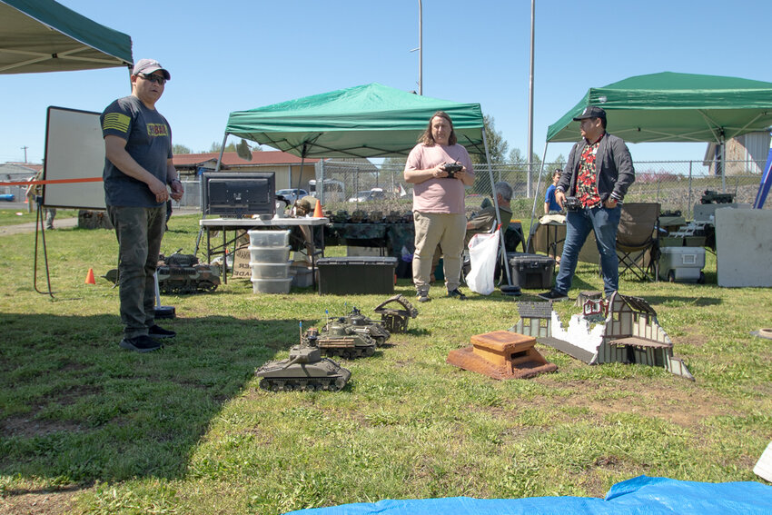 Northwest Division Pacific Armor Corps club members line up their RC tanks in preparation for a simulated tank battle outside of the Veterans Memorial Museum in Chehalis on Saturday.