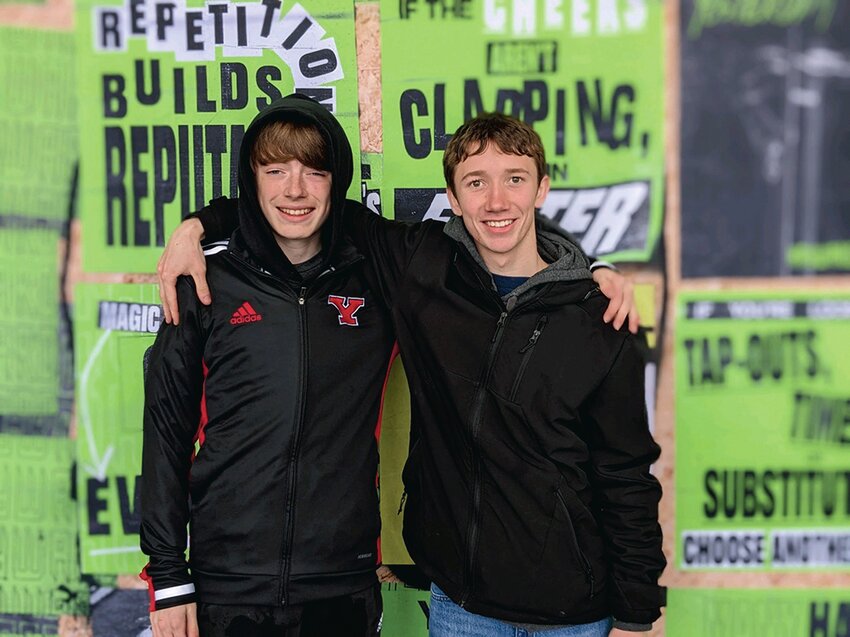 Long distance runners Sam Hall and Zach Walsh pose for a photo in Eugene, Oregon.