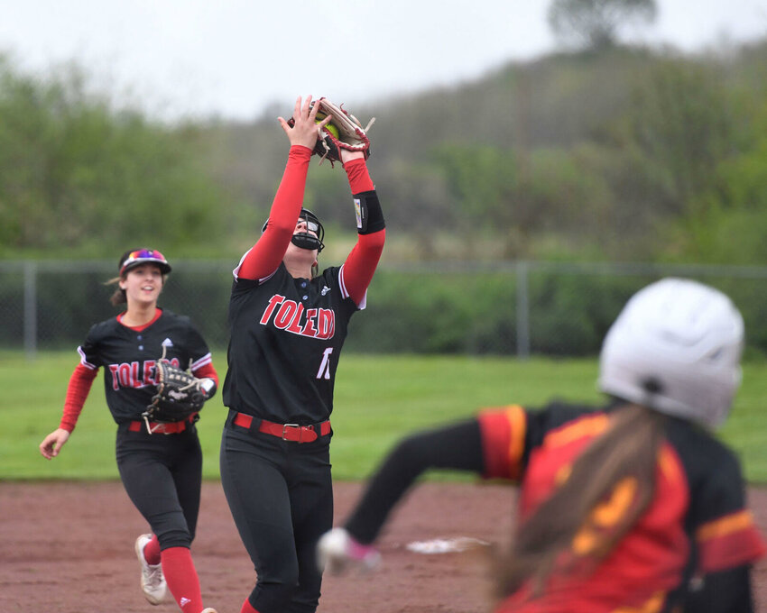 Toledo pitcher Bethany Bowen catches a pop fly off the bat of a Winlock player at the Toledo softball fields on Thursday, May 4. Toledo won 15-0 in three innings in the Battle of the Cowlitz that doubled as Senior Night for the hometown Riverhawks.