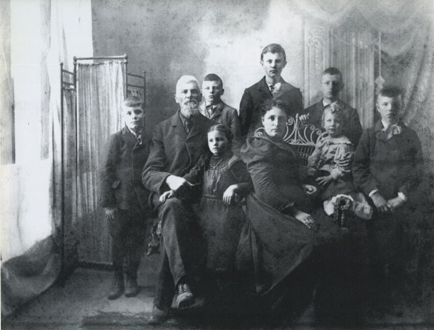 Brigham Buswell is pictured with his wife and seven children in this photo provided by his grandson, Toledo resident Don Buswell.