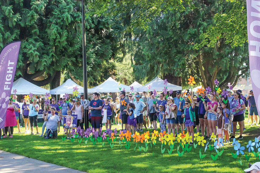 A crowd gathers at Esther Short Park in Vancouver during a previous Walk to End Alzheimer&rsquo;s event.