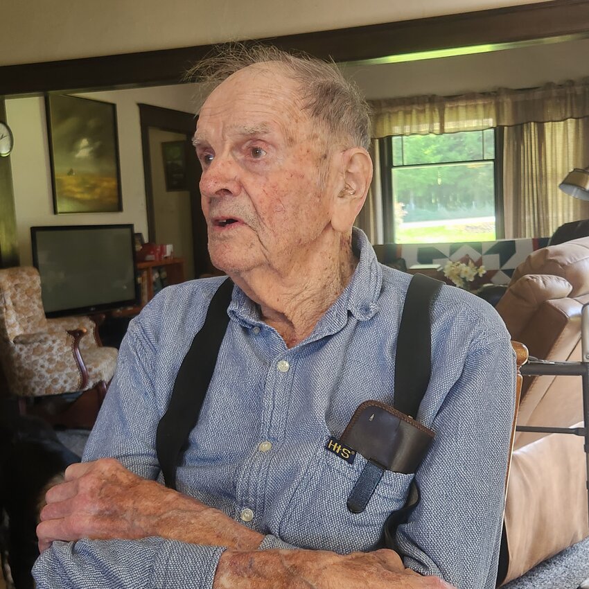 Don Buswell, a centenarian from Toledo, is pictured at 100 in this photo by Julie McDonald.