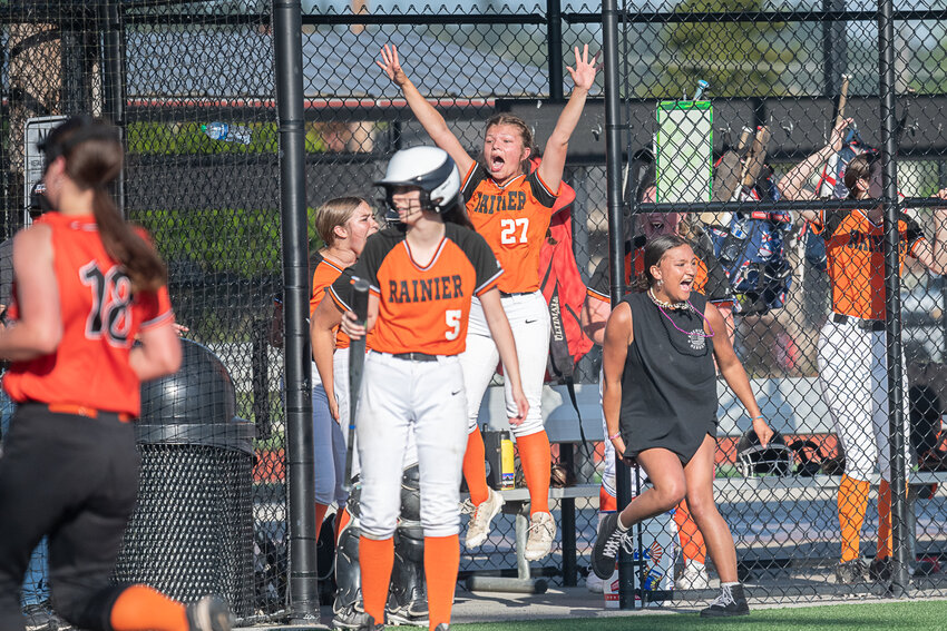 Raychel Hansen (27) celebrates a run during Rainier's 8-2 win over Kalama in the first round of the 2B District tournament, at Rec Park on May 16.