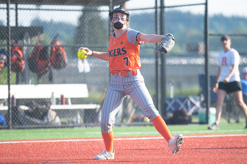 Peyton Smith winds up to throw to first for an out during Centralia's 5-2 loss to Ridgefield in the 2A District 4 championship, May 19 at Rec Park in Chehalis.