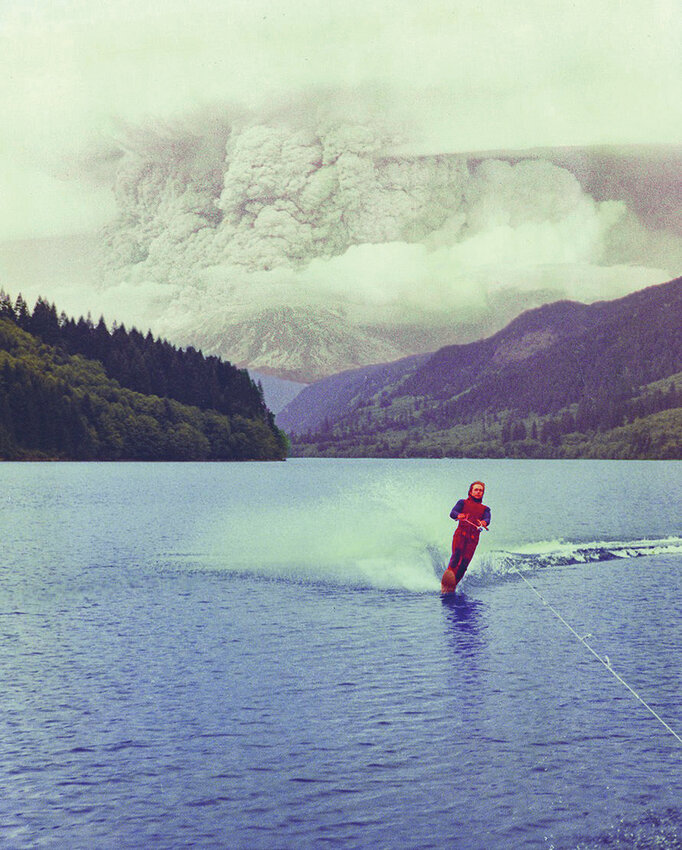Jim Hobson, 19, of Battle Ground, water-skis on May 18, 1980, as Mount St. Helens erupts in the background.