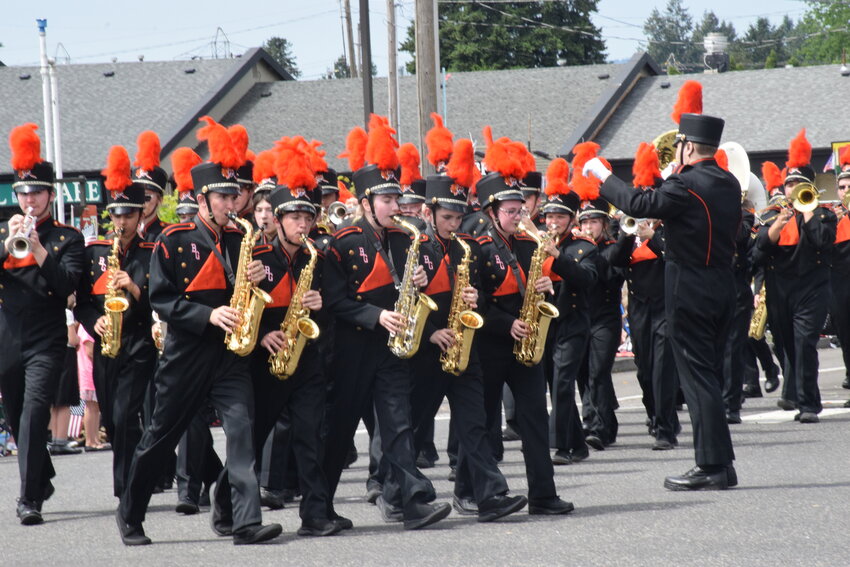 The Battle Ground High School marching band makes its way up Northeast Highway 99 as part of the 2023 Hazel Dell Parade of Bands on May 20.