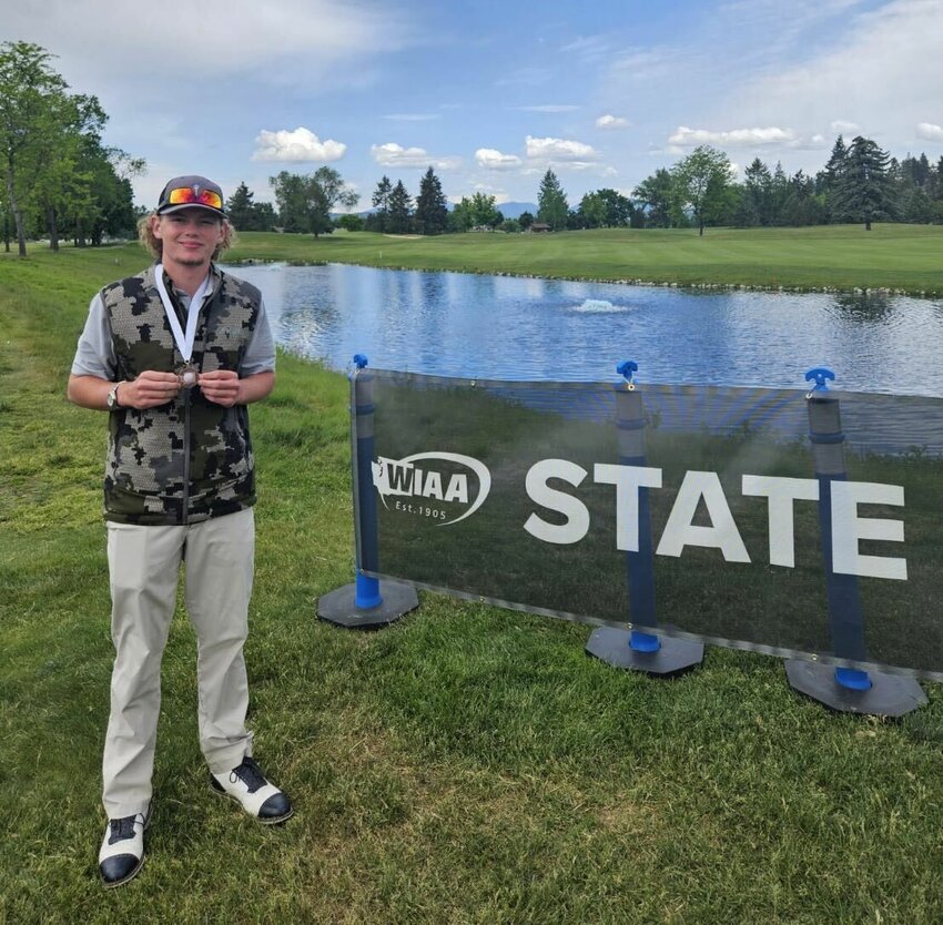 Centralia's Von Wasson poses with his second-place medal at the 2A Boys State Golf Championships May 24 at Liberty Lake.