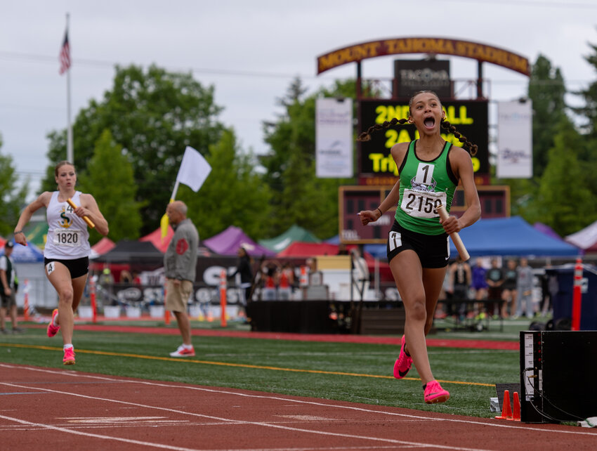 Tumwater&rsquo;s Ava Jones lets out a scream as she crosses the finish line with a victory in the 2A girls 4x200 relay at the WIAA 2A/3A/4A State Track and Field Championships on Saturday, May 27, 2023, at Mount Tahoma High School in Tacoma. (Joshua Hart/For The Chronicle)