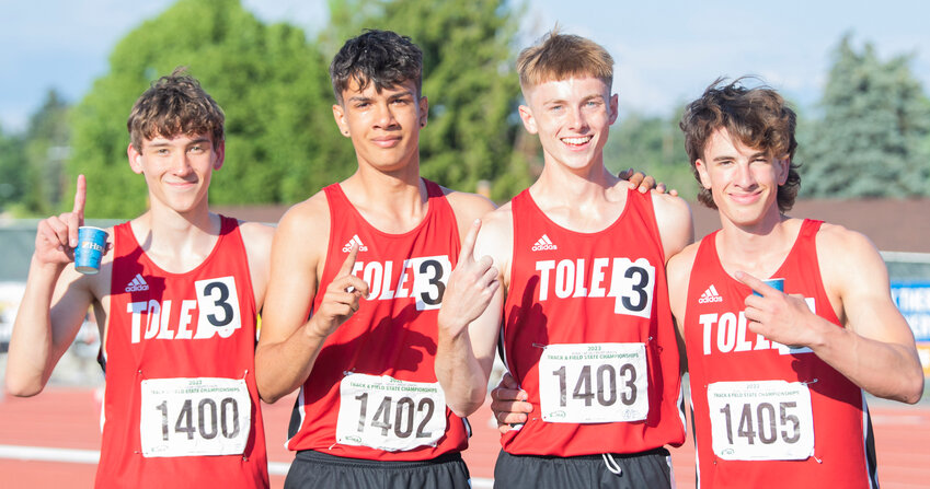 From left, Toledo&rsquo;s 4x400 relay team Trevin Gale, Jordan McKenzie, Conner Olmstead and John Rose smile for a photo together as tears stain their cheeks moments after winning the 2B State championship during the track and field meet in Yakima on Saturday.