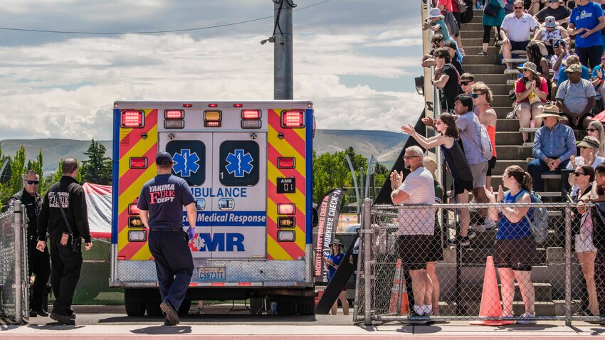 An ambulance leaves Zaepfel Stadium at Eisenhower High School Friday after Napavine sprinter Maddie Dickinson collapsed following a race on Friday in Yakima.