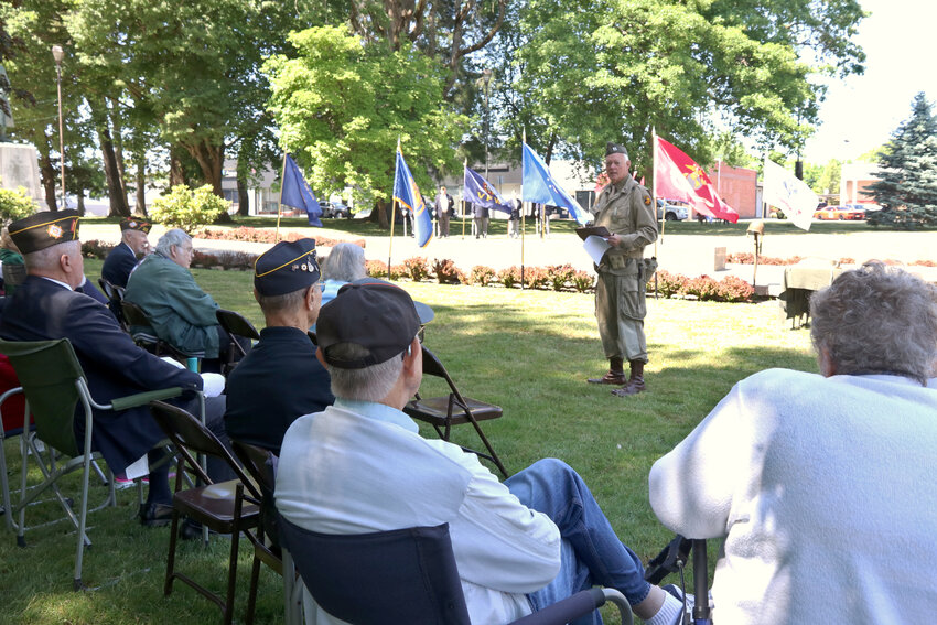 Lewis County Historical Society President Peter Lahmann speaks to attendees of a Memorial Day ceremony at George Washington Park in Centralia Monday. Lahmann is also the owner of America&rsquo;s Team Museum in downtown Centralia.