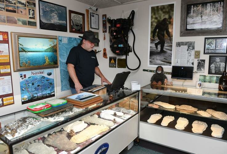 North Fork Survivors owner Jon Bongiovanni works in the back of the shop he runs with his wife on Tuesday, May 23, in Toutle. Bongiovanni worries his gift shop and interpretive center will be affected by the Spirit Lake Memorial Highway depiste being miles away from the natural disaster.