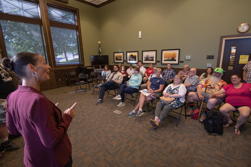 Friends Without Homes certified peer specialist Lisa Striedinger talks to attendees of the &quot;myths and facts on homelessness&quot; forum on Tuesday at the Vernetta Smith Chehalis Timberland Library.