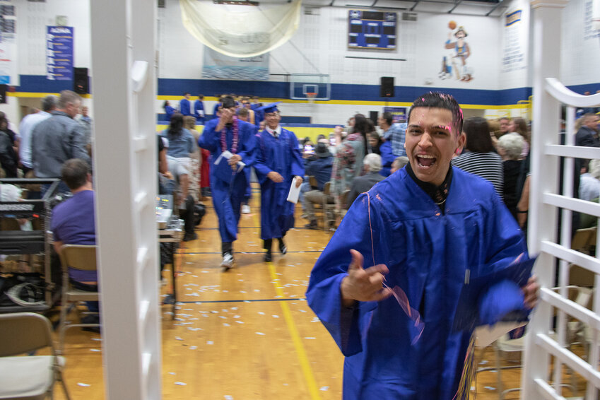 Graduates of the 2023 Adna High School's senior class celebrate at the end of their commencement ceremony on Saturday.