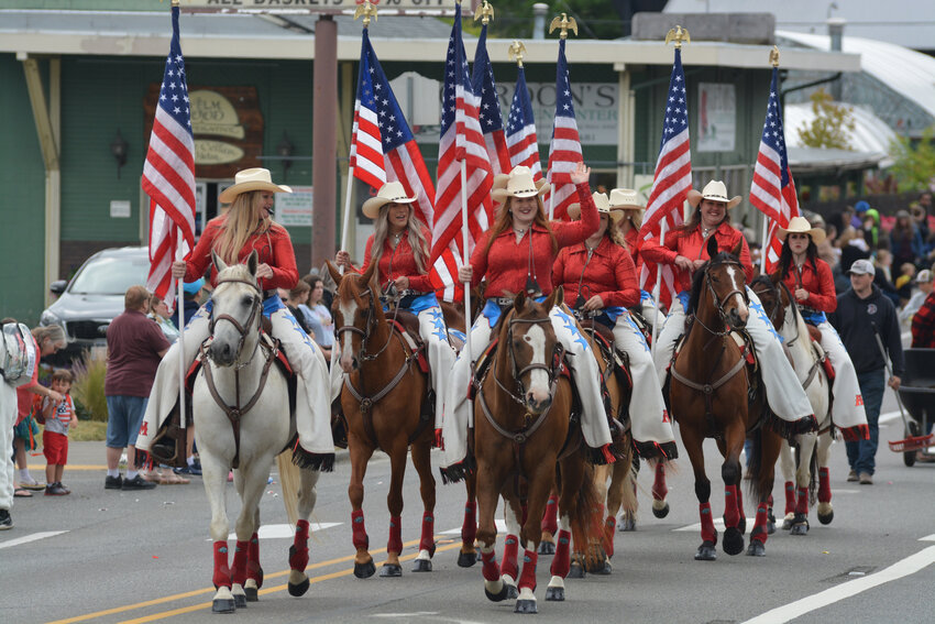 Prairie Days Parade participants sport the red, white and blue on June 24.