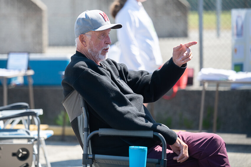 Jack State talks to friends and ex-players during his alumni tournament, June 24 at W.F. West.