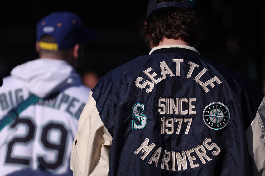 Fans wait outside at T-Mobile Park before the game between the Seattle Mariners and the Colorado Rockies on April 14, 2023, in Seattle. (Steph Chambers/Getty Images/TNS)