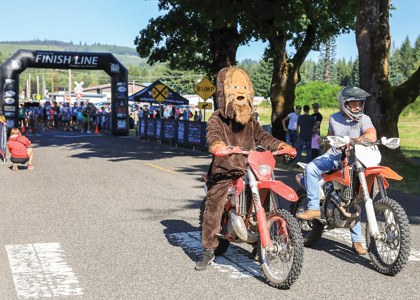The route leaders are pictured on their dirt bikes waiting for the Bigfoot 5K and 10K run to get underway on Saturday, July 1.