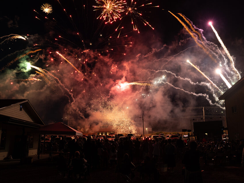 Fireworks illuminate the sky over Jesus Name Pentecostal Church's Freedom Celebration in Chehalis Sunday evening, July 2.  The church has been holding the event since 2013. It featured free food, an obstacle course, bounce houses, entertainment and a fireworks show.