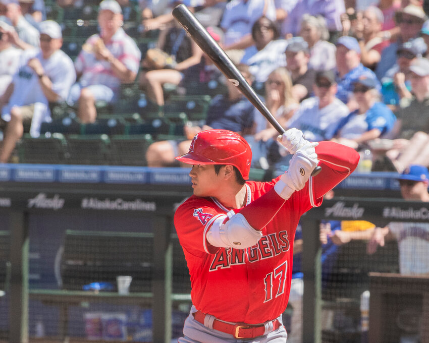 Shohei Ohtani bats during a game against the Mariners in 2022.