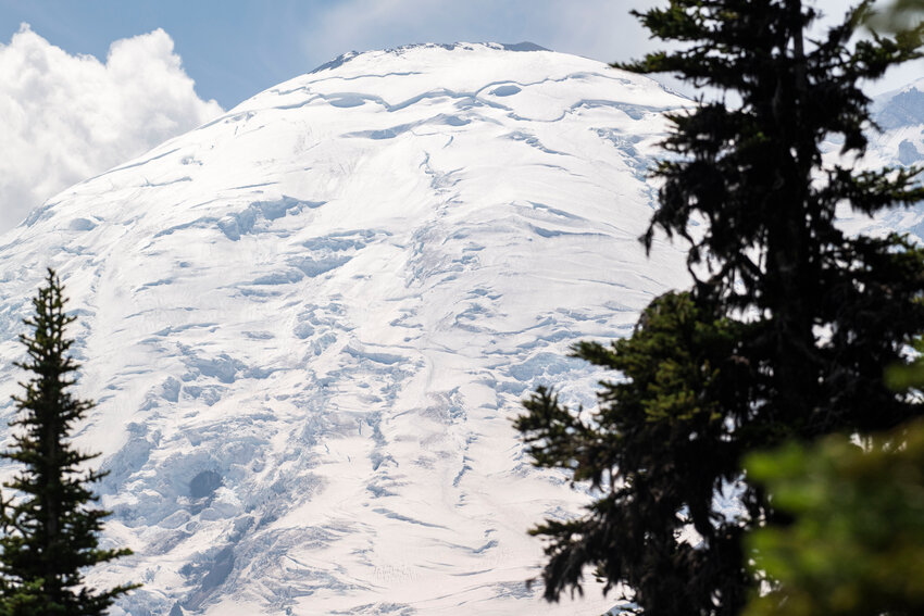From about 6,400-foot elevation at Sunrise, Mount Rainier&rsquo;s summit and its eastern face, covered in ice caves, crevices and glaciers, are visible on Thursday.