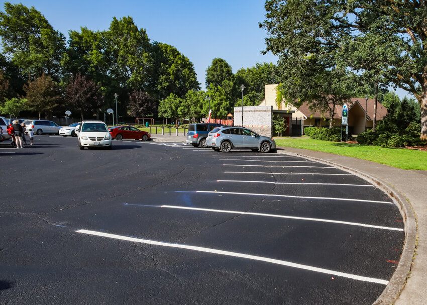 An &ldquo;after&rdquo; look at the Kiwanis Park parking lot on Wednesday, July 5, after 2Down Services LLC finished their seal coat and striping project.