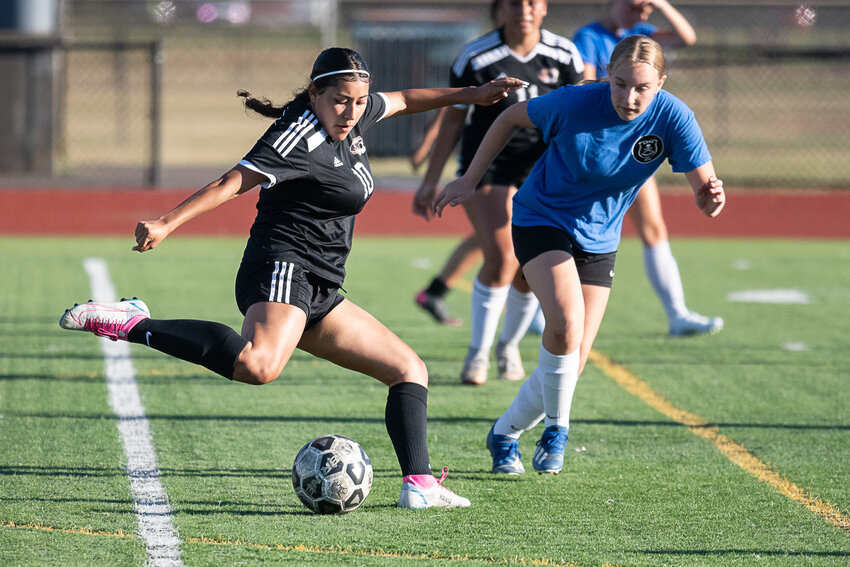 Anahi Corona fires off a shot during Centralia's scrimmage against Adna on July 13 at Tiger Stadium.