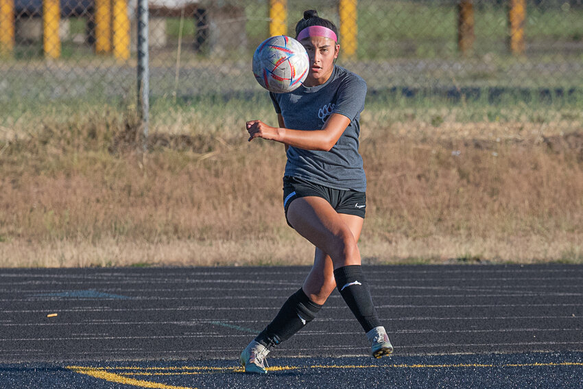 W.F. West's Jaelynn Fuentes whips in  a corner kick to her teammates during a scrimmage against Tenino on July 17.