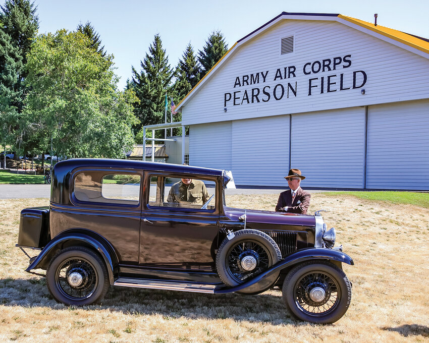 A World War II era vehicle sits in front of the Pearson Air Museum at Fort Vancouver National Historic Site for a World War II encampment display on Saturday, July 22. To see more on the display, go to the History page on B5.