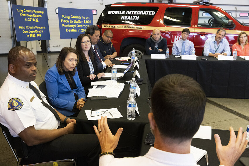 U.S. Senator Maria Cantwell (second from left)  listens to Brad Finegood (back to camera at right) with Seattle-King County Public Health as she holds a roundtable discussion with local leaders regarding the fentanyl crisis in Washington state Monday, July 24, 2023, at the Seattle Fire Department station at 400 S. Washington St. (Ellen M. Banner/The Seattle Times/TNS)